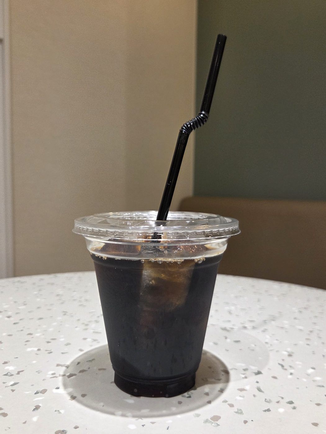ストローつきのアイスコーヒー